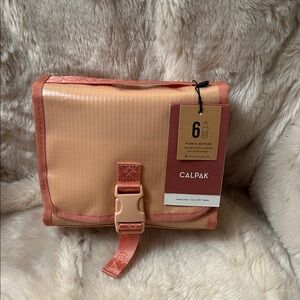 Calpak Peach and Tan Hanging Toiletry Bag